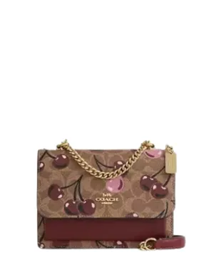 Coach Mini Klare Crossbody Bag In Signature Canvas With Cherry Print